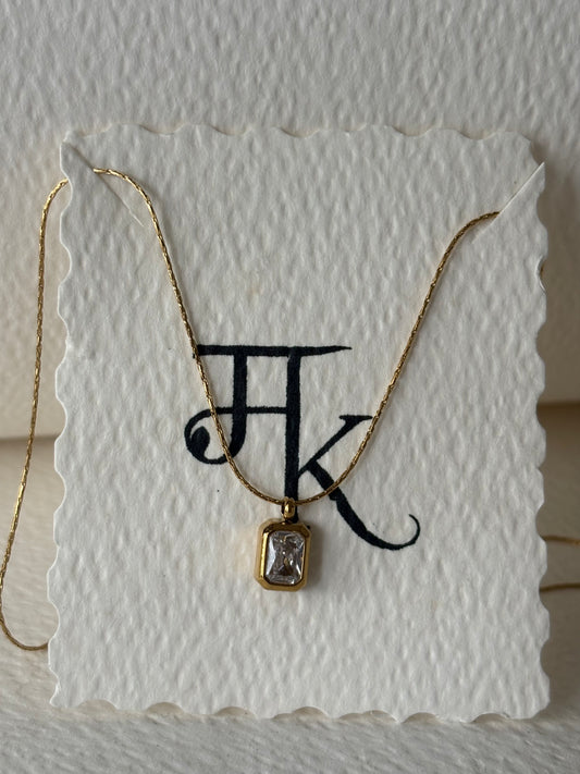 The Bezel Emerald-Cut Solitaire Necklace