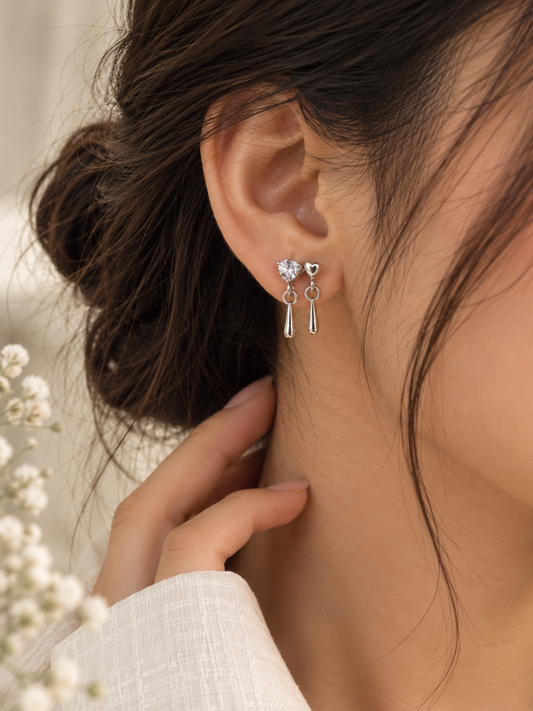 The Dual Heart Dangle Studs