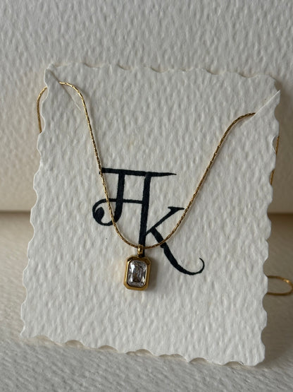 The Bezel Emerald-Cut Solitaire Necklace
