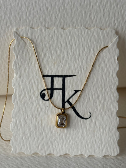 The Bezel Emerald-Cut Solitaire Necklace